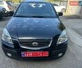 Черный Киа Рио, объемом двигателя 1.4 л и пробегом 167 тыс. км за 5200 $, фото 1 на Automoto.ua