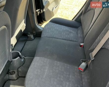 Черный Киа Рио, объемом двигателя 1.4 л и пробегом 103 тыс. км за 3400 $, фото 21 на Automoto.ua