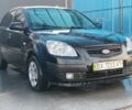 Черный Киа Рио, объемом двигателя 1.4 л и пробегом 349 тыс. км за 2599 $, фото 5 на Automoto.ua