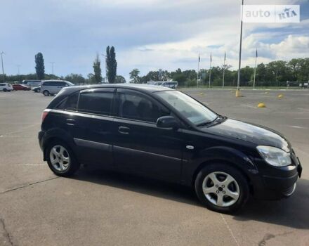 Черный Киа Рио, объемом двигателя 1.4 л и пробегом 222 тыс. км за 4100 $, фото 2 на Automoto.ua