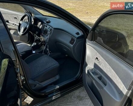 Черный Киа Рио, объемом двигателя 1.4 л и пробегом 103 тыс. км за 3400 $, фото 22 на Automoto.ua