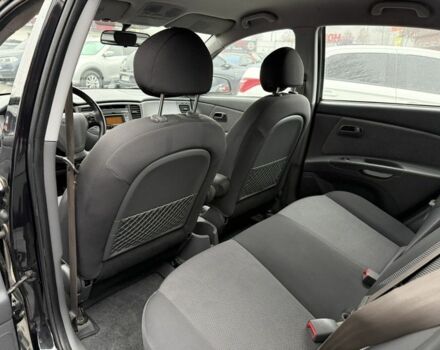 Черный Киа Рио, объемом двигателя 1.4 л и пробегом 166 тыс. км за 5999 $, фото 7 на Automoto.ua