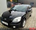 Черный Киа Рио, объемом двигателя 1.4 л и пробегом 230 тыс. км за 3600 $, фото 1 на Automoto.ua