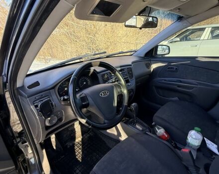 Чорний Кіа Ріо, об'ємом двигуна 1.4 л та пробігом 208 тис. км за 6200 $, фото 7 на Automoto.ua