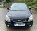 Чорний Кіа Ріо, об'ємом двигуна 1.5 л та пробігом 241 тис. км за 4350 $, фото 12 на Automoto.ua