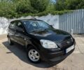 Черный Киа Рио, объемом двигателя 1.4 л и пробегом 160 тыс. км за 5993 $, фото 1 на Automoto.ua