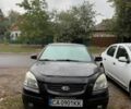 Чорний Кіа Ріо, об'ємом двигуна 1.4 л та пробігом 140 тис. км за 6500 $, фото 7 на Automoto.ua