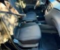 Черный Киа Рио, объемом двигателя 1.4 л и пробегом 269 тыс. км за 2999 $, фото 7 на Automoto.ua