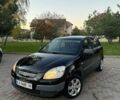 Черный Киа Рио, объемом двигателя 1.4 л и пробегом 269 тыс. км за 3400 $, фото 1 на Automoto.ua
