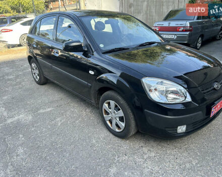 Чорний Кіа Ріо, об'ємом двигуна 1.4 л та пробігом 166 тис. км за 6100 $, фото 1 на Automoto.ua