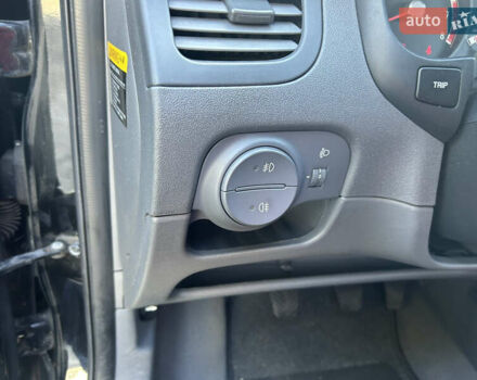 Чорний Кіа Ріо, об'ємом двигуна 1.4 л та пробігом 166 тис. км за 6100 $, фото 8 на Automoto.ua