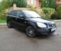 Черный Киа Рио, объемом двигателя 1.4 л и пробегом 216 тыс. км за 3700 $, фото 1 на Automoto.ua