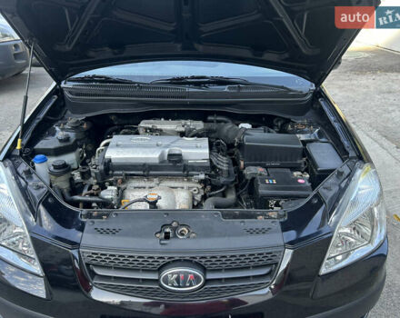 Чорний Кіа Ріо, об'ємом двигуна 1.4 л та пробігом 166 тис. км за 6100 $, фото 10 на Automoto.ua