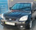 Черный Киа Рио, объемом двигателя 1.4 л и пробегом 349 тыс. км за 2599 $, фото 2 на Automoto.ua