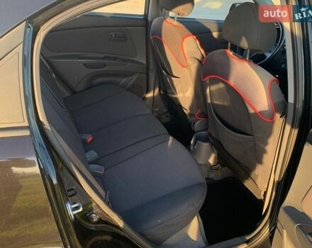Черный Киа Рио, объемом двигателя 1.49 л и пробегом 244 тыс. км за 3500 $, фото 6 на Automoto.ua