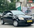 Чорний Кіа Ріо, об'ємом двигуна 1.4 л та пробігом 260 тис. км за 4800 $, фото 1 на Automoto.ua