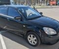 Черный Киа Рио, объемом двигателя 1.4 л и пробегом 287 тыс. км за 4400 $, фото 1 на Automoto.ua