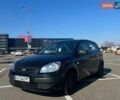 Черный Киа Рио, объемом двигателя 1.4 л и пробегом 167 тыс. км за 4200 $, фото 1 на Automoto.ua