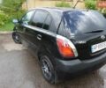 Черный Киа Рио, объемом двигателя 1.4 л и пробегом 216 тыс. км за 3700 $, фото 12 на Automoto.ua