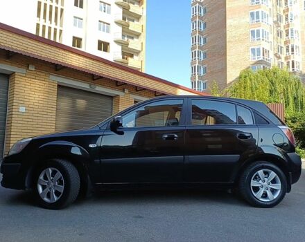 Черный Киа Рио, объемом двигателя 1.4 л и пробегом 212 тыс. км за 4430 $, фото 2 на Automoto.ua