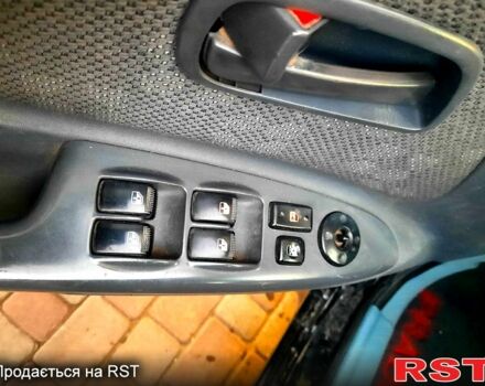 Черный Киа Рио, объемом двигателя 1.4 л и пробегом 392 тыс. км за 3700 $, фото 6 на Automoto.ua