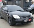 Черный Киа Рио, объемом двигателя 1.4 л и пробегом 274 тыс. км за 5290 $, фото 2 на Automoto.ua