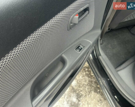 Чорний Кіа Ріо, об'ємом двигуна 1.4 л та пробігом 166 тис. км за 5450 $, фото 10 на Automoto.ua