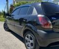 Черный Киа Рио, объемом двигателя 1.4 л и пробегом 240 тыс. км за 5200 $, фото 5 на Automoto.ua
