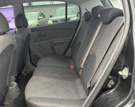 Черный Киа Рио, объемом двигателя 1.4 л и пробегом 250 тыс. км за 2600 $, фото 7 на Automoto.ua