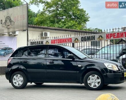 Чорний Кіа Ріо, об'ємом двигуна 1.4 л та пробігом 260 тис. км за 4800 $, фото 1 на Automoto.ua