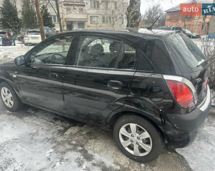 Чорний Кіа Ріо, об'ємом двигуна 1.4 л та пробігом 166 тис. км за 5450 $, фото 4 на Automoto.ua