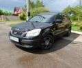 Черный Киа Рио, объемом двигателя 1.4 л и пробегом 216 тыс. км за 3607 $, фото 1 на Automoto.ua