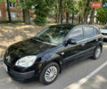 Черный Киа Рио, объемом двигателя 1.4 л и пробегом 193 тыс. км за 5800 $, фото 4 на Automoto.ua