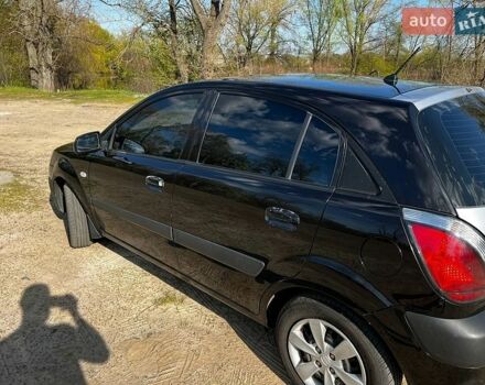 Черный Киа Рио, объемом двигателя 1.4 л и пробегом 103 тыс. км за 3400 $, фото 8 на Automoto.ua