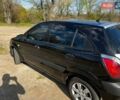 Черный Киа Рио, объемом двигателя 1.4 л и пробегом 103 тыс. км за 3400 $, фото 8 на Automoto.ua