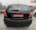 Черный Киа Рио, объемом двигателя 1.4 л и пробегом 166 тыс. км за 6000 $, фото 9 на Automoto.ua