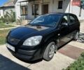 Черный Киа Рио, объемом двигателя 1.4 л и пробегом 214 тыс. км за 5100 $, фото 6 на Automoto.ua