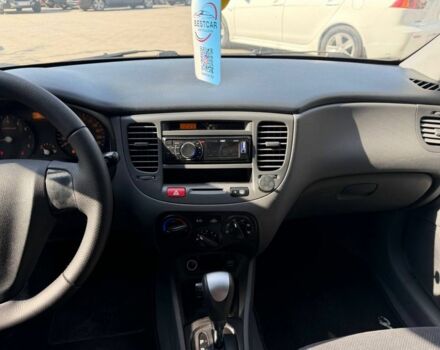 Чорний Кіа Ріо, об'ємом двигуна 1.4 л та пробігом 160 тис. км за 5494 $, фото 10 на Automoto.ua
