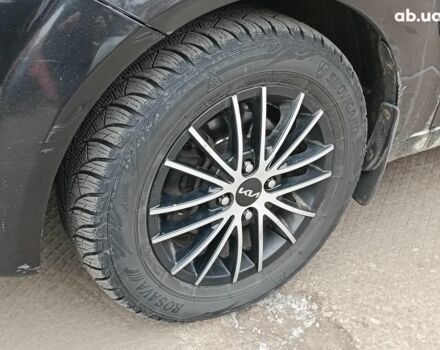 Черный Киа Рио, объемом двигателя 1.4 л и пробегом 274 тыс. км за 5290 $, фото 3 на Automoto.ua