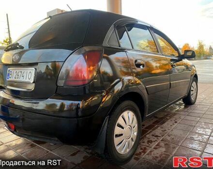 Чорний Кіа Ріо, об'ємом двигуна 1.4 л та пробігом 160 тис. км за 3900 $, фото 2 на Automoto.ua