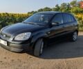 Черный Киа Рио, объемом двигателя 1.4 л и пробегом 160 тыс. км за 6200 $, фото 1 на Automoto.ua