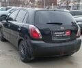 Черный Киа Рио, объемом двигателя 1.4 л и пробегом 274 тыс. км за 5290 $, фото 4 на Automoto.ua
