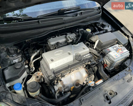 Черный Киа Рио, объемом двигателя 1.4 л и пробегом 193 тыс. км за 5800 $, фото 6 на Automoto.ua