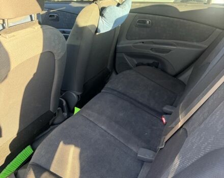 Чорний Кіа Ріо, об'ємом двигуна 1.4 л та пробігом 208 тис. км за 6200 $, фото 4 на Automoto.ua