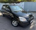 Чорний Кіа Ріо, об'ємом двигуна 1.4 л та пробігом 160 тис. км за 5494 $, фото 1 на Automoto.ua