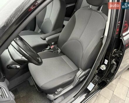 Черный Киа Рио, объемом двигателя 1.4 л и пробегом 166 тыс. км за 6000 $, фото 12 на Automoto.ua