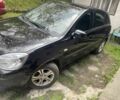 Черный Киа Рио, объемом двигателя 1.4 л и пробегом 260 тыс. км за 3600 $, фото 5 на Automoto.ua