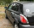 Чорний Кіа Ріо, об'ємом двигуна 1.4 л та пробігом 140 тис. км за 6500 $, фото 11 на Automoto.ua
