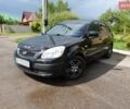 Черный Киа Рио, объемом двигателя 1.4 л и пробегом 216 тыс. км за 3700 $, фото 4 на Automoto.ua