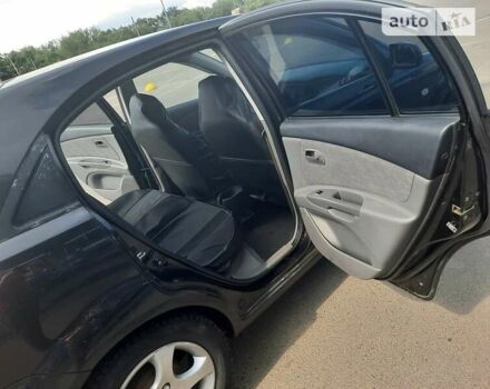 Черный Киа Рио, объемом двигателя 1.4 л и пробегом 222 тыс. км за 4100 $, фото 7 на Automoto.ua